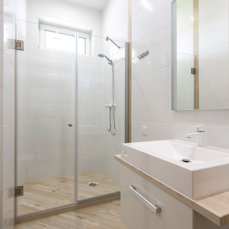 Spotless bathroom with glass shower